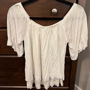 Gimmicks off the shoulder top